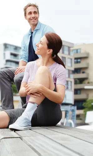 Sprunggelenkbandage Actimove TaloMotion weiß-grau